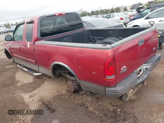 2002 Ford F-150 XL with VIN 1FTRX17W72NB88475, listed as a IAAI auction lot 41574244 with 200,396 mi miles. Bid and sale history available at carsss.com. Image 3.