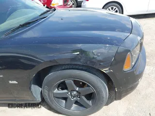 2007 Dodge Charger with VIN 2B3KA43G27H652874, listed as a IAAI auction lot 42030171 with 216,231 mi miles and . Bid and sale history available at DreamBid. Image 6.