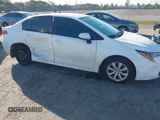 2024 Toyota Corolla LE with VIN 5YFB4MDE7RP218014, listed as a IAAI auction lot 41470209 with 10,877 mi miles. Bid and sale history available at carsss.com. Image 6.