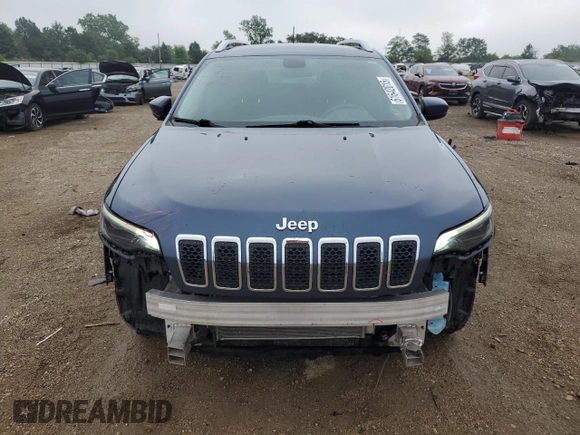 2019 Jeep Cherokee Latitude with VIN 1C4PJLCB9KD412004, listed as a Copart auction lot 61642015 with 121,336 mi miles and Salvage title. Bid and sale history available at DreamBid. Image 5.
