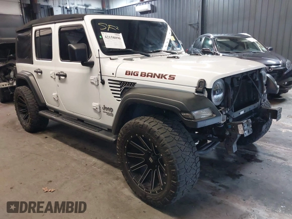 2019 Jeep Wrangler Unlimited Sport S z VIN 1C4HJXDG4KW639403, wystawiony jako IAAI lot #42158096 z przebiegiem 132 569 mil mil oraz . Historia ofert i sprzedaży dostępna na DreamBid. Obrazek 1.