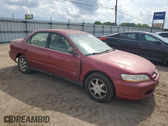 2000 Honda Accord SE with VIN JHMCG5673YC023811, listed as a Copart auction lot 56331885 with 194,416 mi miles and Salvage title. Bid and sale history available at DreamBid. Image 4.