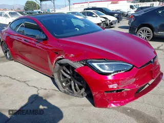 2023 Tesla Model S with VIN 5YJSA1E5XPF519780, listed as a IAAI auction lot 41539675 with Not provided miles and . Bid and sale history available at DreamBid. Image 1.