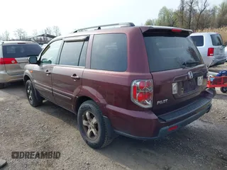 2007 Honda Pilot EX-L with VIN 2HKYF18587H515168, listed as a IAAI auction lot 41950101 with 216,885 mi miles. Bid and sale history available at carsss.com. Image 3.