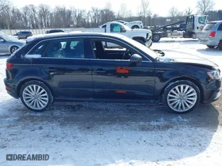 2016 Audi A3 e-tron Premium Plus with VIN WAUTPBFF8GA050534, listed as a IAAI auction lot 41378962 with 104,975 mi miles. Bid and sale history available at carsss.com. Image 13.