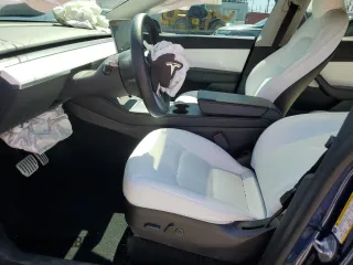 2022 Tesla Model Y Performance z VIN 7SAYGDEF2NF461103, wystawiony jako Copart lot #52198205 z przebiegiem 33 576 mil mil oraz Szkoda całkowita • Salvage title. Historia ofert i sprzedaży dostępna na DreamBid. Obrazek 7.