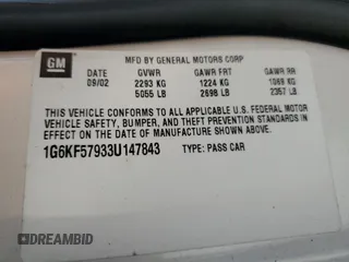 2003 Cadillac DeVille DTS z VIN 1G6KF57933U147843, wystawiony jako Copart lot #55875195 z przebiegiem 160 814 mil mil oraz Szkody całkowita. Historia ofert i sprzedaży dostępna na DreamBid. Obrazek 12.