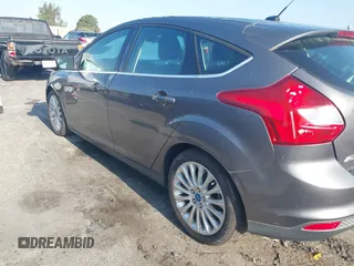 2012 Ford Focus Titanium with VIN 1FAHP3N22CL200249, listed as a IAAI auction lot 42149873 with 103,805 mi miles and . Bid and sale history available at carsss.com. Image 6.