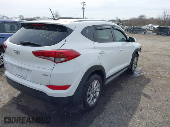 2017 Hyundai Tucson SE with VIN KM8J3CA44HU437644, listed as a IAAI auction lot 41825957 with 59,402 mi miles. Bid and sale history available at carsss.com. Image 4.
