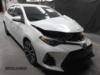 2017 Toyota Corolla L z VIN 5YFBURHE7HP693037, wystawiony jako IAAI lot #42304020 z przebiegiem 117 710 mil mil oraz . Historia ofert i sprzedaży dostępna na DreamBid. Obrazek 1.