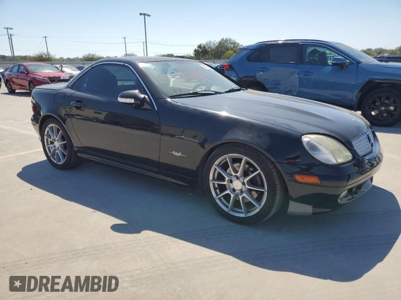2004 Mercedes-Benz SLK-Class with VIN WDBKK65F24F306069, listed as a Copart auction lot 68791864 with 99,835 mi miles and Salvage Title. Bid and sale history available at carsss.com. Image 4.