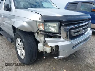 2009 Honda Ridgeline RTL with VIN 2HJYK16539H500986, listed as a IAAI auction lot 42084176 with 161,142 mi miles and . Bid and sale history available at DreamBid. Image 6.