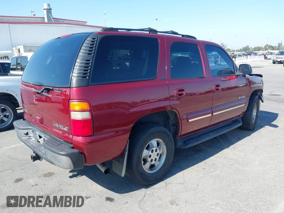 2003 Chevrolet Tahoe LS with VIN 1GNEC13T53R131019, listed as a IAAI auction lot 39673270 with 222,521 mi miles. Bid and sale history available at carsss.com. Image 4.