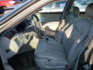 2007 Cadillac DTS V8 z VIN 1G6KD57Y67U136984, wystawiony jako Copart lot #65570084 z przebiegiem 114 814 mil mil oraz Szkoda całkowita • Salvage title. Historia ofert i sprzedaży dostępna na DreamBid. Obrazek 7.