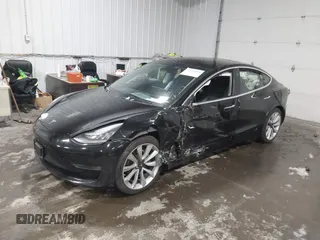 2018 Tesla Model 3 Long Range Battery with VIN 5YJ3E1EB7JF086778, listed as a IAAI auction lot 41348008 with 74,491 mi miles and . Bid and sale history available at DreamBid. Image 17.