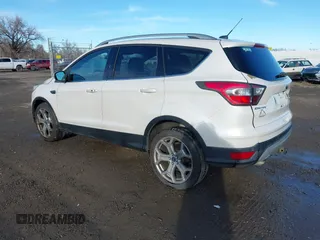 2017 Ford Escape Titanium with VIN 1FMCU9J98HUA04994, listed as a IAAI auction lot 41139988 with 136,989 mi miles. Bid and sale history available at carsss.com. Image 3.