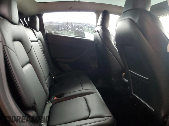 2022 Tesla Model Y Long Range z VIN 7SAYGDEE1NF393187, wystawiony jako Copart lot #56419535 z przebiegiem 82 757 mil mil oraz Nie do naprawy • Non repairable. Historia ofert i sprzedaży dostępna na DreamBid. Obrazek 10.