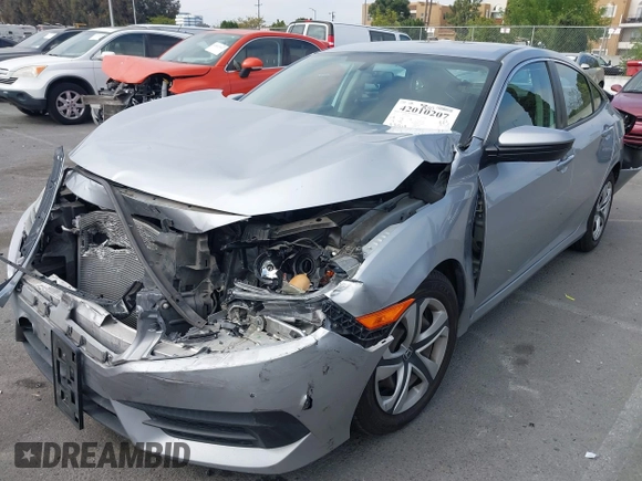 2017 Honda Civic LX with VIN 2HGFC2F5XHH562089, listed as a IAAI auction lot 42010207 with 99,809 mi miles and . Bid and sale history available at DreamBid. Image 2.