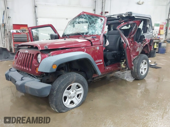 2011 Jeep Wrangler Sport z VIN 1J4AA2D19BL613164, wystawiony jako IAAI lot #42514207 z przebiegiem Nie podano mil oraz . Historia ofert i sprzedaży dostępna na DreamBid. Obrazek 16.
