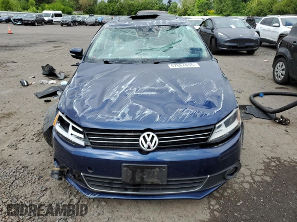 2013 Volkswagen Jetta TDI w/Premium with VIN 3VWLL7AJ6DM386508, listed as a Copart auction lot 57067455 with 127,573 mi miles and Salvage title. Bid and sale history available at DreamBid. Image 5.