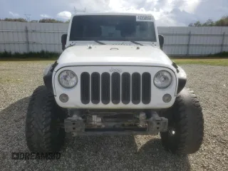 2016 Jeep Wrangler Unlimited Rubicon with VIN 1C4BJWFG1GL229485, listed as a Copart auction lot 49350065 with 75,039 mi miles and Salvage Title. Bid and sale history available at carsss.com. Image 5.