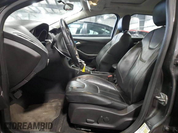 2016 Ford Focus SE z VIN 1FADP3F27GL216059, wystawiony jako Copart lot #59611395 z przebiegiem 170 468 mil mil oraz Szkoda całkowita • Salvage title. Historia ofert i sprzedaży dostępna na DreamBid. Obrazek 7.