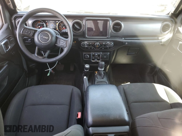 2023 Jeep Gladiator Sport S with VIN 1C6HJTAG3PL552959, listed as a Copart auction lot 56905635 with 30,356 mi miles and Salvage title. Bid and sale history available at DreamBid. Image 8.