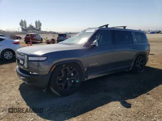 2024 Rivian R1S Adventure with VIN 7PDSGCBA1RN038230, listed as a Copart auction lot 73346304 with 0 mi miles and Salvage Title. Bid and sale history available at carsss.com. Image 1.