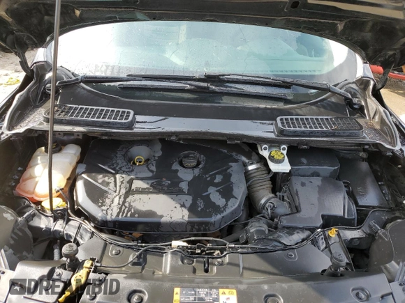 2016 Ford Escape SE z VIN 1FMCU0G99GUA13835, wystawiony jako Copart lot #52401865 z przebiegiem 130 143 mil mil oraz Szkoda całkowita • Salvage title. Historia ofert i sprzedaży dostępna na DreamBid. Obrazek 12.