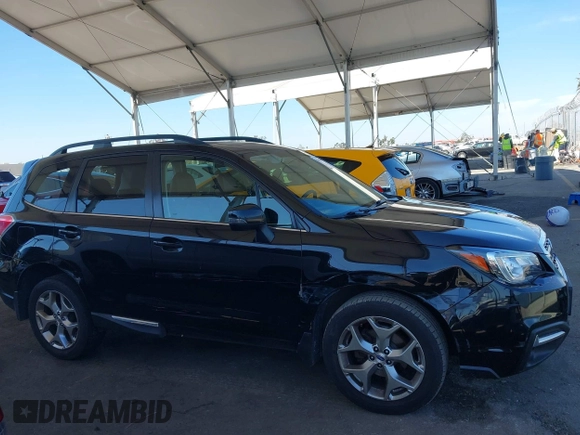 2018 Subaru Forester Touring z VIN JF2SJAWC2JH407593, wystawiony jako IAAI lot #42014886 z przebiegiem 78 349 mil mil oraz . Historia ofert i sprzedaży dostępna na DreamBid. Obrazek 13.