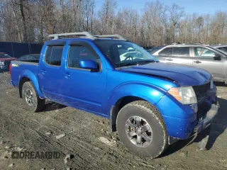 2015 Nissan Frontier Pro-4X with VIN 1N6AD0EVXFN744419, listed as a Copart auction lot 42835395 with 77,691 mi miles and Salvage title. Bid and sale history available at DreamBid. Image 4.