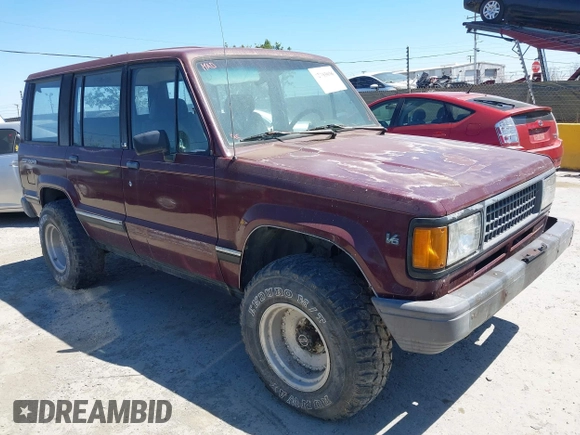 1991 Isuzu Trooper z VIN JACCH58R8M7904079, wystawiony jako IAAI lot #42303036 z przebiegiem 244 672 mil mil oraz . Historia ofert i sprzedaży dostępna na DreamBid. Obrazek 1.
