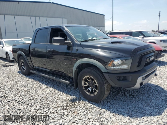 2016 Ram 1500 Rebel with VIN 1C6RR7YT5GS418564, listed as a Copart auction lot 55436645 with 103,949 mi miles and Salvage title. Bid and sale history available at DreamBid. Image 4.