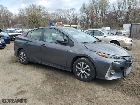 2021 Toyota Prius Prime LE with VIN JTDKAMFP6M3174483, listed as a Copart auction lot 50347165 with 66,988 mi miles and Salvage Title. Bid and sale history available at carsss.com. Image 4.