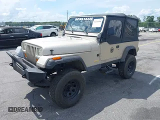 1995 Jeep Wrangler S z VIN 1J4FY19P7SP242989, wystawiony jako IAAI lot #42241996 z przebiegiem 203 520 mil mil oraz . Historia ofert i sprzedaży dostępna na DreamBid. Obrazek 2.