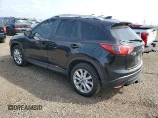 2015 Mazda CX-5 Grand Touring with VIN JM3KE4DY9F0516357, listed as a Copart auction lot 53156215 with 118,621 mi miles and Salvage Title. Bid and sale history available at DreamBid. Image 2.