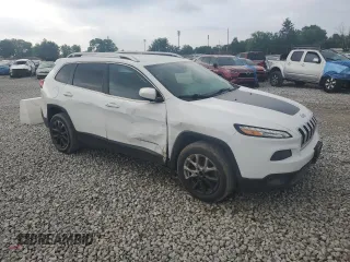 2017 Jeep Cherokee Latitude with VIN 1C4PJLCB1HW661748, listed as a Copart auction lot 58900255 with 133,498 mi miles and Salvage title. Bid and sale history available at DreamBid. Image 4.