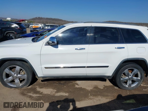 2013 Jeep Grand Cherokee Overland with VIN 1C4RJECT4DC526160, listed as a IAAI auction lot 41429164 with 115,311 mi miles. Bid and sale history available at carsss.com. Image 14.
