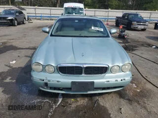 2004 Jaguar XJ with VIN SAJWA71C94SG24466, listed as a Copart auction lot 46610995 with 173,570 mi miles and Salvage Title. Bid and sale history available at carsss.com. Image 5.