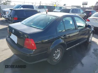2000 Volkswagen Jetta GLS z VIN 3VWSA29M3YM047424, wystawiony jako IAAI lot #41610862 z przebiegiem 216 902 mil mil oraz . Historia ofert i sprzedaży dostępna na DreamBid. Obrazek 4.