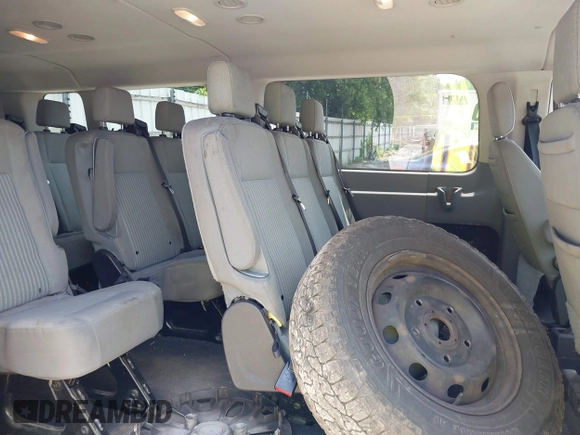 2019 Ford Transit Passenger XL z VIN 1FBZX2YM4KKB64966, wystawiony jako IAAI lot #42417498 z przebiegiem 157 311 mil mil oraz . Historia ofert i sprzedaży dostępna na DreamBid. Obrazek 8.