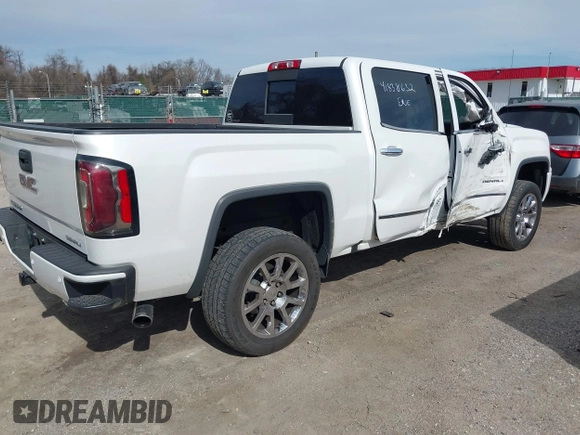 2017 GMC Sierra 1500 Denali with VIN 3GTU2PEC2HG438632, listed as a IAAI auction lot 41838632 with 80,319 mi miles and . Bid and sale history available at DreamBid. Image 4.