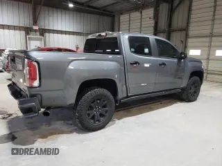 2022 GMC Canyon 4WD AT4 w/Leather with VIN 1GTG6FEN1N1175900, listed as a Copart auction lot 85957514 with 56,811 mi miles and Salvage Title. Bid and sale history available at carsss.com. Image 3.