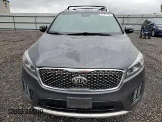 2016 Kia Sorento SX z VIN 5XYPKDA51GG152979, wystawiony jako Copart lot #57942165 z przebiegiem 189 283 mil mil oraz Szkoda całkowita • Salvage title. Historia ofert i sprzedaży dostępna na DreamBid. Obrazek 5.