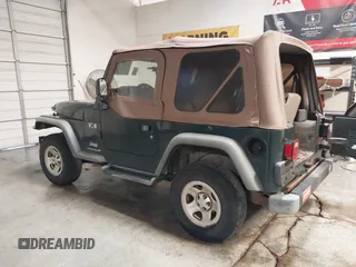2003 Jeep Wrangler X z VIN 1J4FA39S43P339234, wystawiony jako IAAI lot #41329654 z przebiegiem 175 376 mil mil oraz . Historia ofert i sprzedaży dostępna na DreamBid. Obrazek 3.