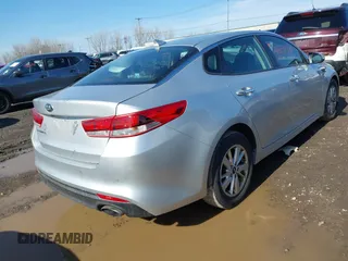 2016 Kia Optima LX with VIN 5XXGT4L34GG078857, listed as a IAAI auction lot 41819971 with 112,963 mi miles. Bid and sale history available at carsss.com. Image 4.