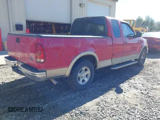 1999 Ford F-150 XL with VIN 1FTRX17LXXNA18592, listed as a IAAI auction lot 40929037 with 1 mi miles. Bid and sale history available at carsss.com. Image 4.