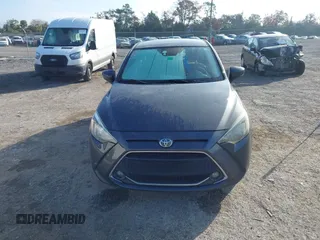 2019 Toyota Yaris Sedan L with VIN 3MYDLBYVXKY506966, listed as a IAAI auction lot 41455800 with 106,284 mi miles. Bid and sale history available at carsss.com. Image 12.