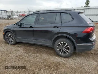 2023 Volkswagen Tiguan S with VIN 3VVRB7AX0PM038326, listed as a Copart auction lot 56350825 with 50,013 mi miles and Salvage title. Bid and sale history available at DreamBid. Image 2.