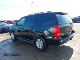 2011 GMC Yukon SLE with VIN 1GKS1AE01BR108215, listed as a IAAI auction lot 41379402 with 195,171 mi miles. Bid and sale history available at carsss.com. Image 14.